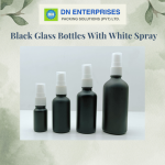 Black Glass Bottles With White Spray